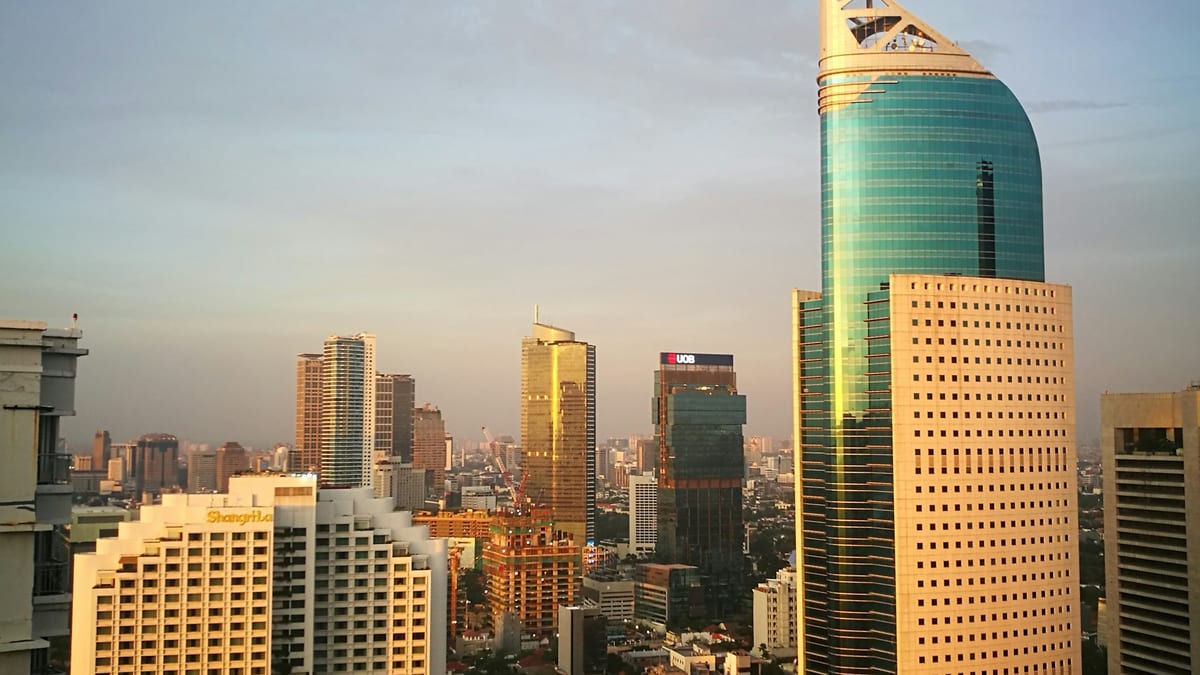Jakarta Sudirman skyline golden hour — stay