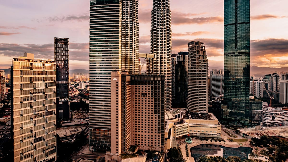 KLCC sunset skyline — tax residency