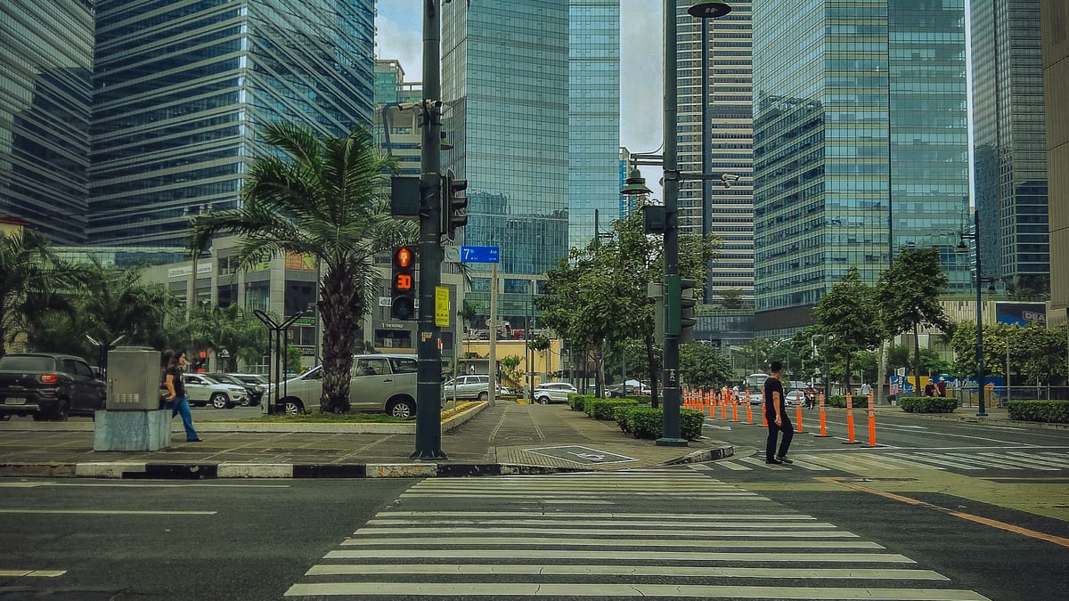 BGC street and glass towers — tax for aliens