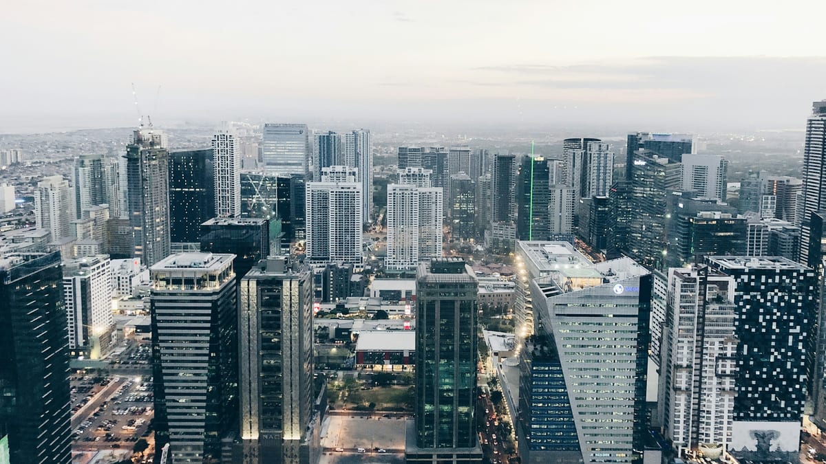 Bonifacio Global City dusk aerial — Philippines stay