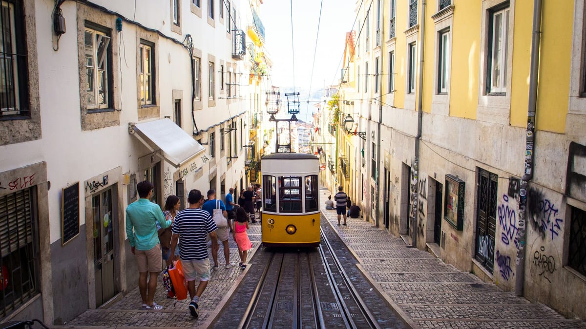 Lisbon Bica funicular on steep street — earn