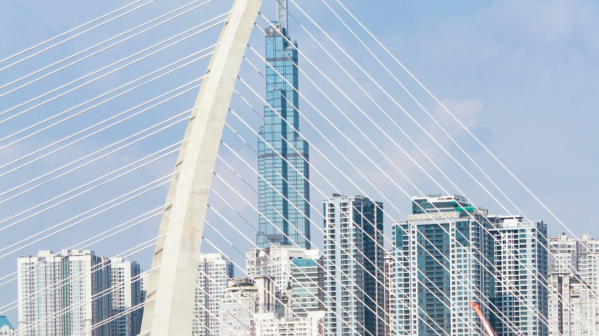 Landmark 81 seen through bridge cables in Ho Chi Minh City